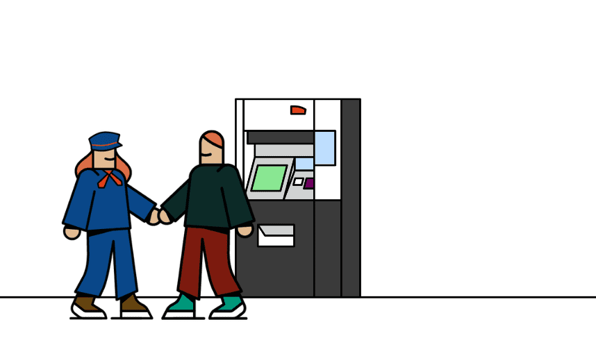 Un agent et un voyageur sont devant un automate de vente