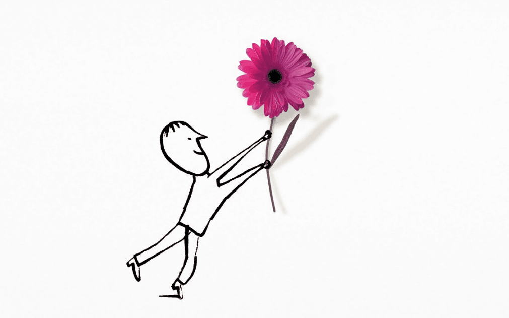 Un personnage dessiné  qui tient une fleur dans les mains  (un gerbera rose)