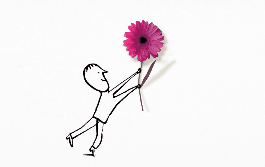 Un personnage dessiné  qui tient une fleur dans les mains  (un gerbera rose)